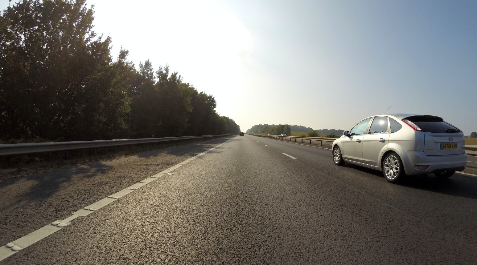 Car driving on road.