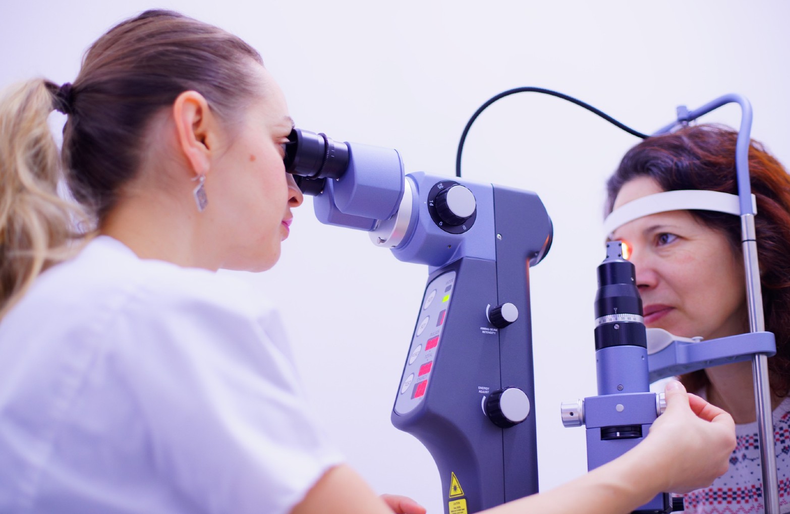Woman receiving medical eye care.